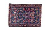 Antique Kerman square rug with a unidirectional tree of life motif in red and sand on an indigo field.