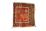 Antique hand-knotted Northwest Persian square rug with madder root red field, Herati, bird, and animal motifs.