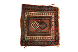 Antique Bagface Jaff Kurd rug, repeating guls in ivory, sapphire, and madder red.