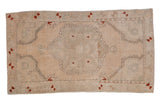 Distressed Oushak rug, faded cream floral medallion, seafoam and rust accents, 2'5