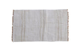 Vintage hemp kilim rug mat with a textured plain-weave in soft natural shades of ivory and beige.