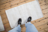 A vintage hemp kilim rug with a durable plain-weave, shown to scale.