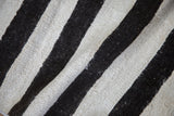 Plain-weave Turkish Hemp Kilim featuring textured charcoal and ivory stripes.