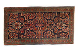 Vintage Persian Sarouk runner, cobalt blue field, madder red floral bouquets, arabesque borders.