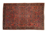 Antique Fine Mohajeran Sarouk rug, hand knotted, dusty red floral field, blue arabesque border.