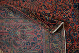 Finely woven reverse, secured fringe, and dusty rose floral pile of an antique Sarouk.