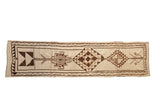 Vintage hand-knotted Kurd runner with ivory, oxidized silver, and dark brown geometric patterns.