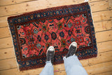 Vintage Lilihan rug with vivid gem-tone floral panels and palmettes shown to scale.