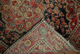 Hand-knotted construction visible on the folded corner of the vintage Josan Sarouk rug.