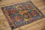 Angled perspective of a fine antique Farahan Sarouk rug, showing the full multi-medallion design.