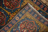 Hand-knotted pile and back weave of an antique Farahan Sarouk rug's folded corner.