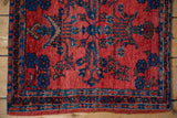 Close-up showing the triple banded border and low pile texture of an antique German Sarouk sampler mat.