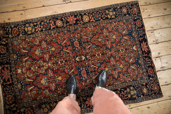 Antique Farahan Sarouk rug showing the scale of its palmette and floral pattern from overhead.