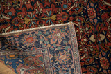 Folded corner of an antique Farahan Sarouk showing the fine hand-knotted rug foundation.