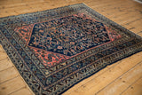 Vintage Lilihan rug corner, with deep blue Herati field, blush spandrel, and patterned border.