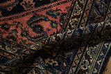 Textured pile of a vintage Lilihan rug with blush pink and cobalt blue Herati motif.
