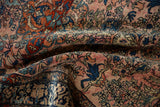 Intricate floral and scrolling arabesque details on the fine, low pile of an antique Farahan Sarouk.