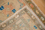 Hand-knotted reverse of distressed vintage Oushak rug, showing tight weave and muted colors.