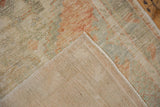 Back view of the distressed Oushak rug runner showing the hand-knotted foundation and secured side cord.