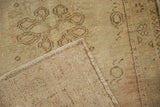 Hand-knotted foundation and intact side selvage of a vintage Turkish Oushak rug.