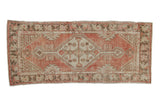 Hand-knotted Oushak runner, dusty red blush and ivory geometric medallion, distressed finish. 2'10