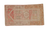 Distressed Oushak rug, faded pink and red geometric design, heavy abrasions, 2'5