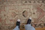 Vintage Distressed Oushak runner with prominent wear, muted blush red, beige, and dark brown patterns.