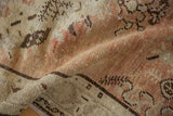 Distressed vintage Oushak rug pile texture, showing even wear and soft terracotta hues.
