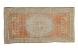 Distressed Oushak rug, tangerine orange, floral medallion with vines, ocean green, 2'11