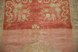 Heavily abrashed texture and dye lot variation in shades of raspberry red and pale pink.