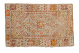 Distressed vintage Oushak rug, elongated floral medallion, geometric border, muted colors, 2'8