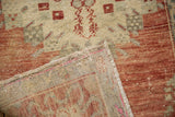 Hand-knotted foundation and secured side cord of a vintage Turkish Oushak rug.