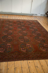 Distressed Ersari carpet, geometric guls with plant motifs, abrash, and chestnut red, rose, green pile.