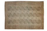 Distressed Ersari carpet, ivory, beige, dusty teal triple column gul medallions.