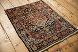 Angled perspective of a vintage Josan Sarouk rug showing its full traditional floral pattern.