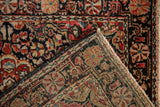 The hand-knotted foundation and intact side cord selvage of a vintage Josan Sarouk rug.