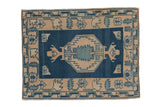 Distressed Oushak square rug, dusty sapphire blue abrashed field, ivory hexagonal medallion.