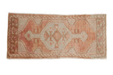 Distressed Oushak rug runner, abrashed sandalwood and ivory field with hexagonal medallion and vine border.