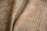 Worn pile texture of a distressed vintage Oushak rug with ivory and dusty rust tones.