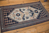Distressed Turkish Dosemealti runner with a corner turned to show the intact side cord.