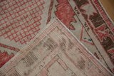 The reverse side of a vintage Oushak runner, showing its hand-knotted foundation and intact selvage.