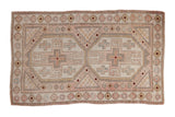 Distressed Oushak rug with double octagonal medallions in muted rose, ivory, and blue, 2'6