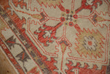 Close-up view of the distressed Oushak rug's low pile revealing the hand-knotted texture and weave.
