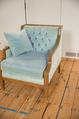 Baby blue mohair velvet seat cushion, piped edge, and carved wood frame detail.