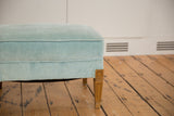 Vintage 1960s baby blue mohair velvet footstool upholstery showing age.