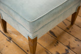 Vintage 1960s baby blue mohair velvet footstool corner, displaying piping and carved leg.