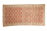 Distressed vintage Oushak carpet with faded raspberry red and ivory allover botanical design, 4'10