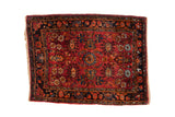 Vintage Lilihan square rug with an allover floral pattern in raspberry red, sapphire, and powder blue.