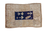 Vintage distressed Tulu rug mat with a cobalt blue center panel and ivory geometric motifs.