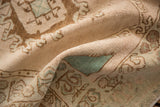 Soft, hand-knotted pile and even wear of a vintage distressed Oushak rug.
